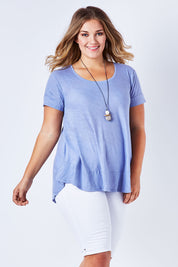 Model Kate wearing size 16 of The Pull On Short in colour White (White), from the front, showing the whole outfit