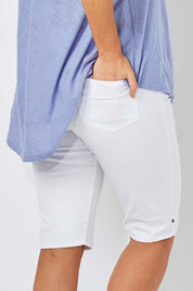Model Laura wearing size 12 of The Pull On Short in colour White (White), from the back