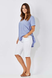 Model Laura wearing size 12 of The Pull On Short in colour White (White)