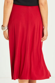 Model Terri-Leigh wearing size 14 of The Recycled Pull On Skirt in colour Cherryred (Red), from the back