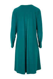 Product shot of The Recycled Swing Cardigan in colour Deeplagoon (Green), from the back
