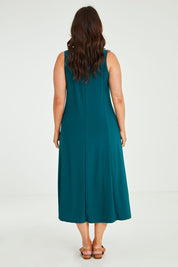 Model Laura wearing size 14 of The Recycled A Line Midi Dress in colour Deeplagoon (Green), from the back
