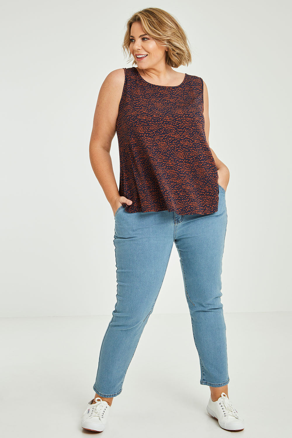 Model Fiona wearing size 16 of The Weekender Jeans in colour Lightdenim (Blue), from the front, showing the whole outfit