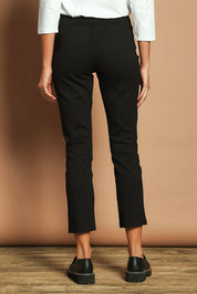 Model Madeline wearing size 10 of The Straight Leg Ponte Pant in colour Black (Black), from the back