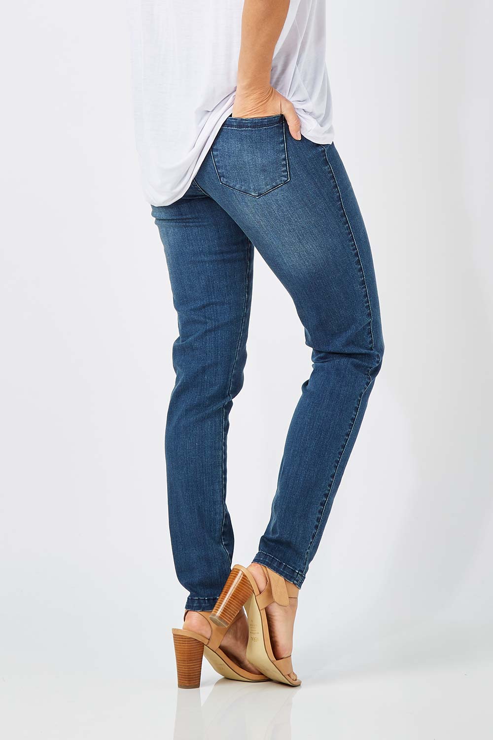 Model Anna wearing size 10 of The Everyday Jegging in colour Denim (Blue), from the front, cropped image