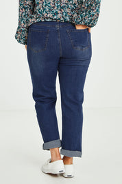 Model Laura wearing size 14 of the Preloved The Keepers Highwaisted Straight Jean in colour Darkdenim (Blue), from the back