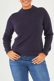 Model Noli wearing size L of The Essential Soft Rib Skivvy in colour Navy (Blue), from the front, cropped image