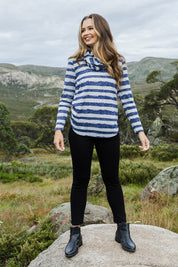 Model Tahlia wearing size 10 of The Striped Curved Hem Long Sleeve Tee in colour Cornflower (Blue), from the front, showing the whole outfit