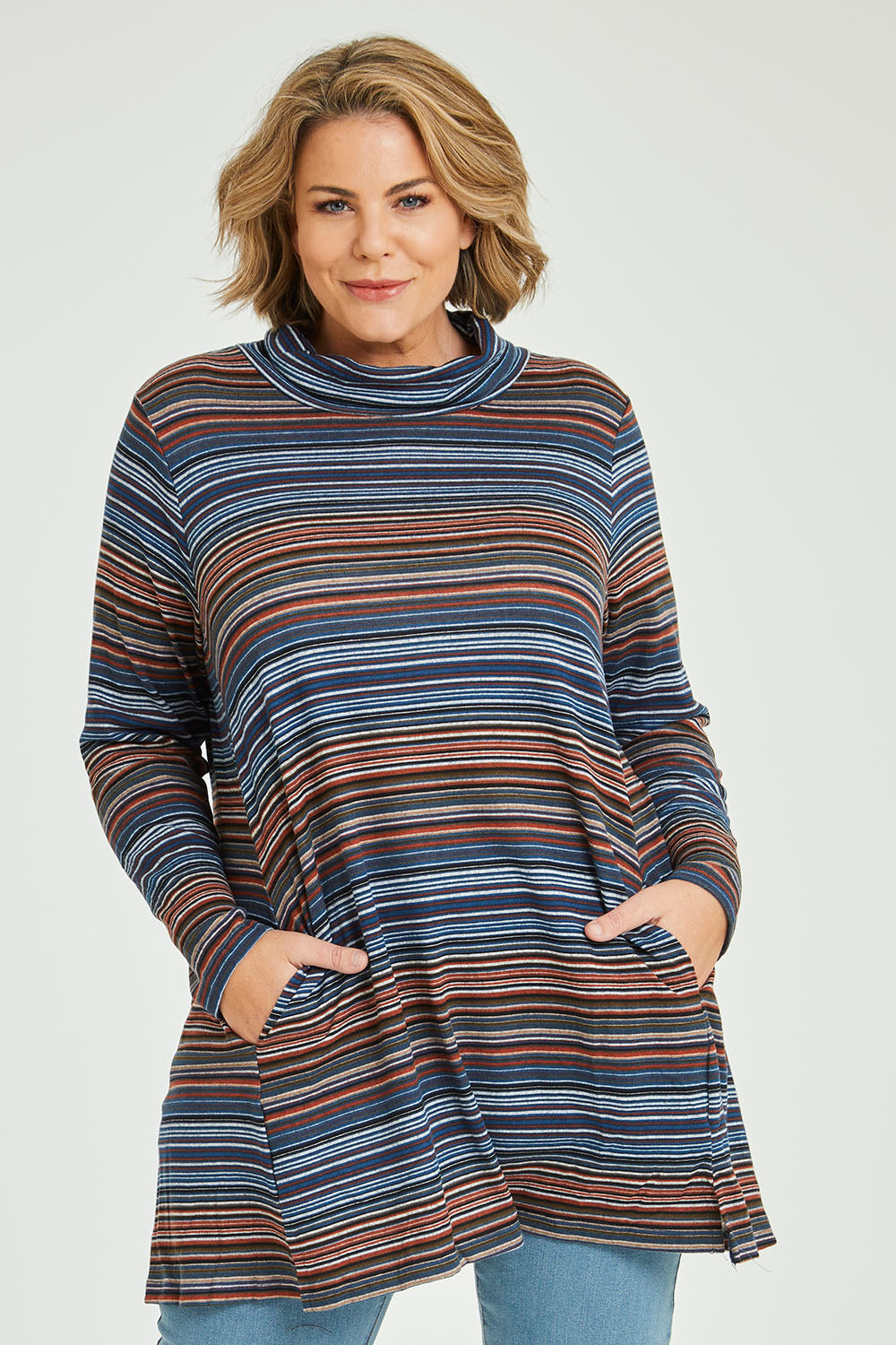 Model Fiona wearing size 16 of The Striped Light Knit Tunic in colour Bluestripe (Blue), from the front, cropped image