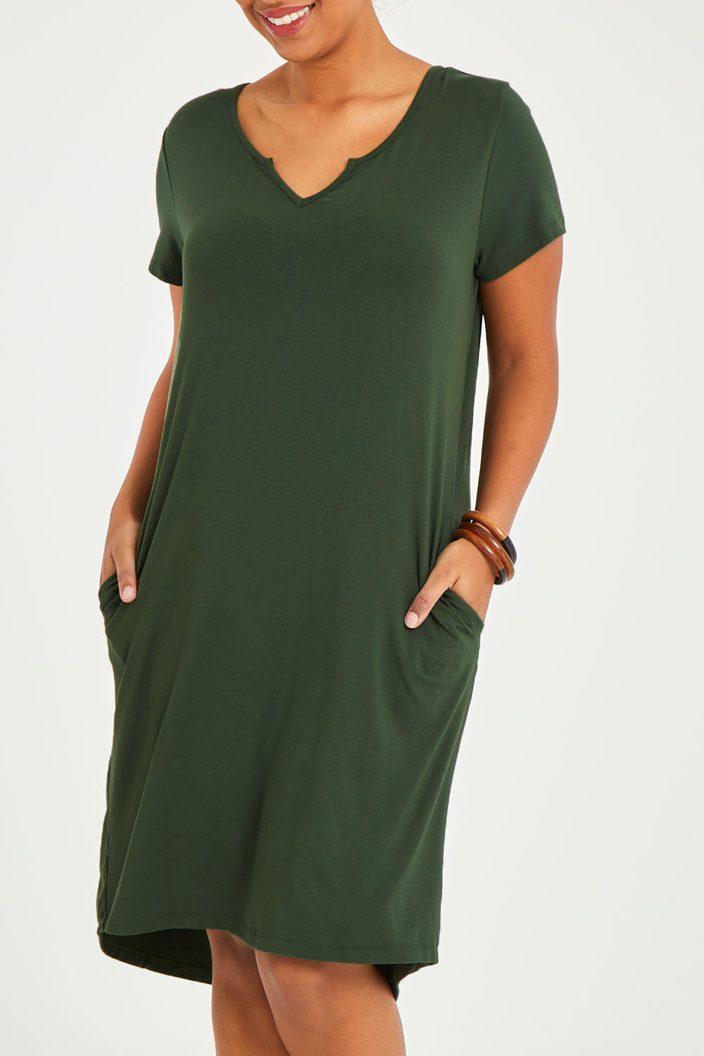 Model Noli wearing size 14 of the Preloved The V Split Midi Tee Dress in colour Khaki (Green), from the front, cropped image