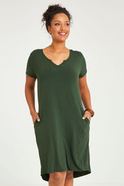 Model Noli wearing size 14 of the Preloved The V Split Midi Tee Dress in colour Khaki (Green), from the front, cropped image
