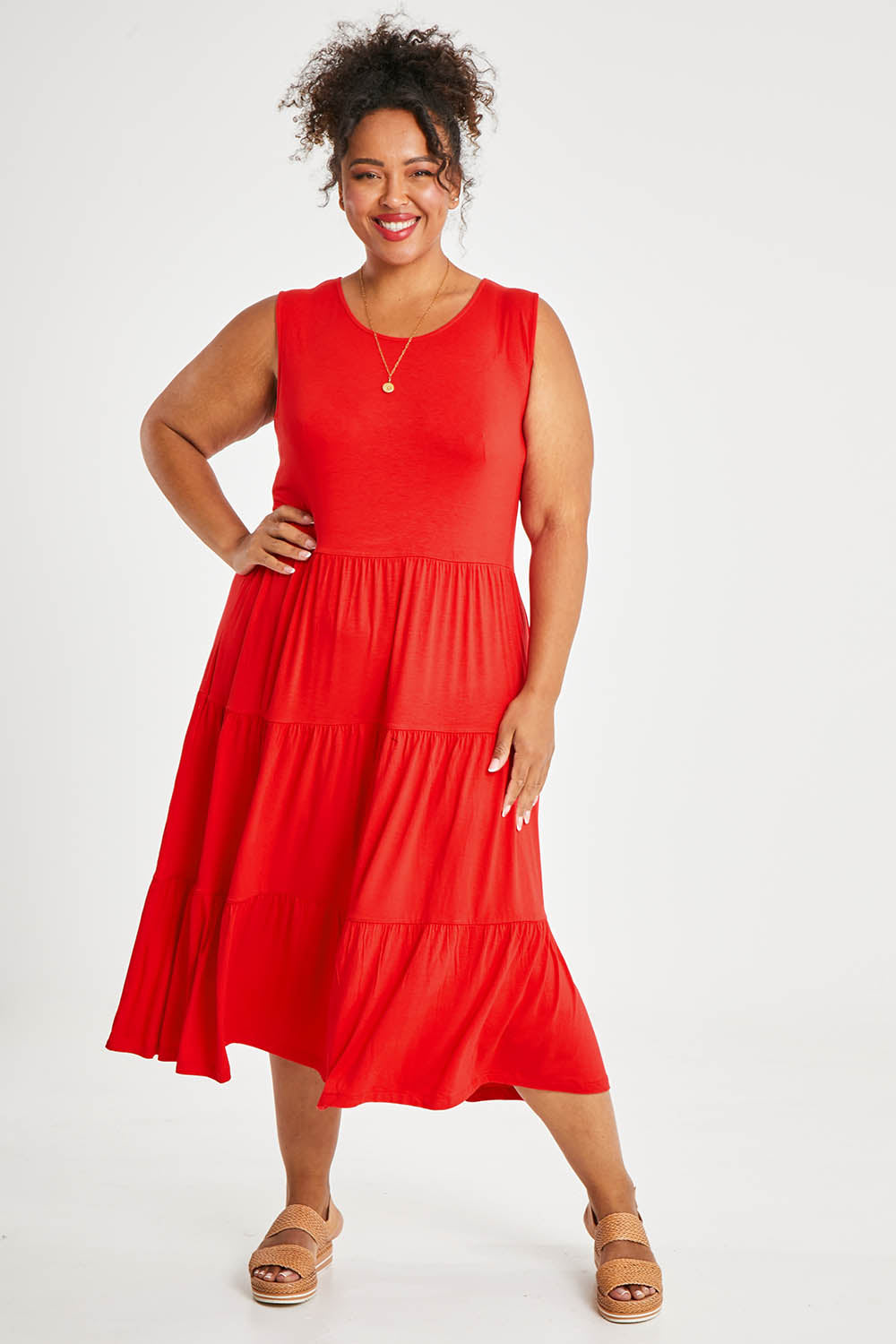 Model Alexis wearing size 16 of The Tiered Tank Dress in colour Red (Red), from the front, showing the whole outfit