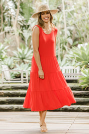 Model Amanda wearing size 10 of The Tiered Tank Dress in colour Red (Red), from the front, showing the whole outfit