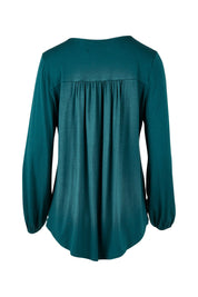 Product shot of The V Neck Tie Top in colour Juniper (Green), from the back