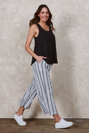 Model Madeline wearing size 10 of The Striped Pull On Cullotte in colour Blackwhite (Black), from the front, showing the whole outfit