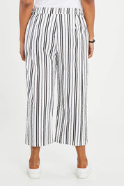 Model Noli wearing size 14 of The Striped Pull On Cullotte in colour Blackwhite (Black), from the back