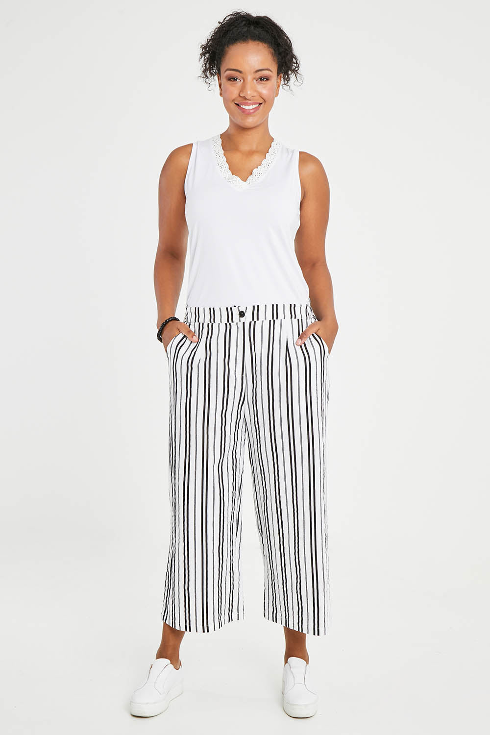 Model Noli wearing size 14 of The Striped Pull On Cullotte in colour Blackwhite (Black), from the front, showing the whole outfit