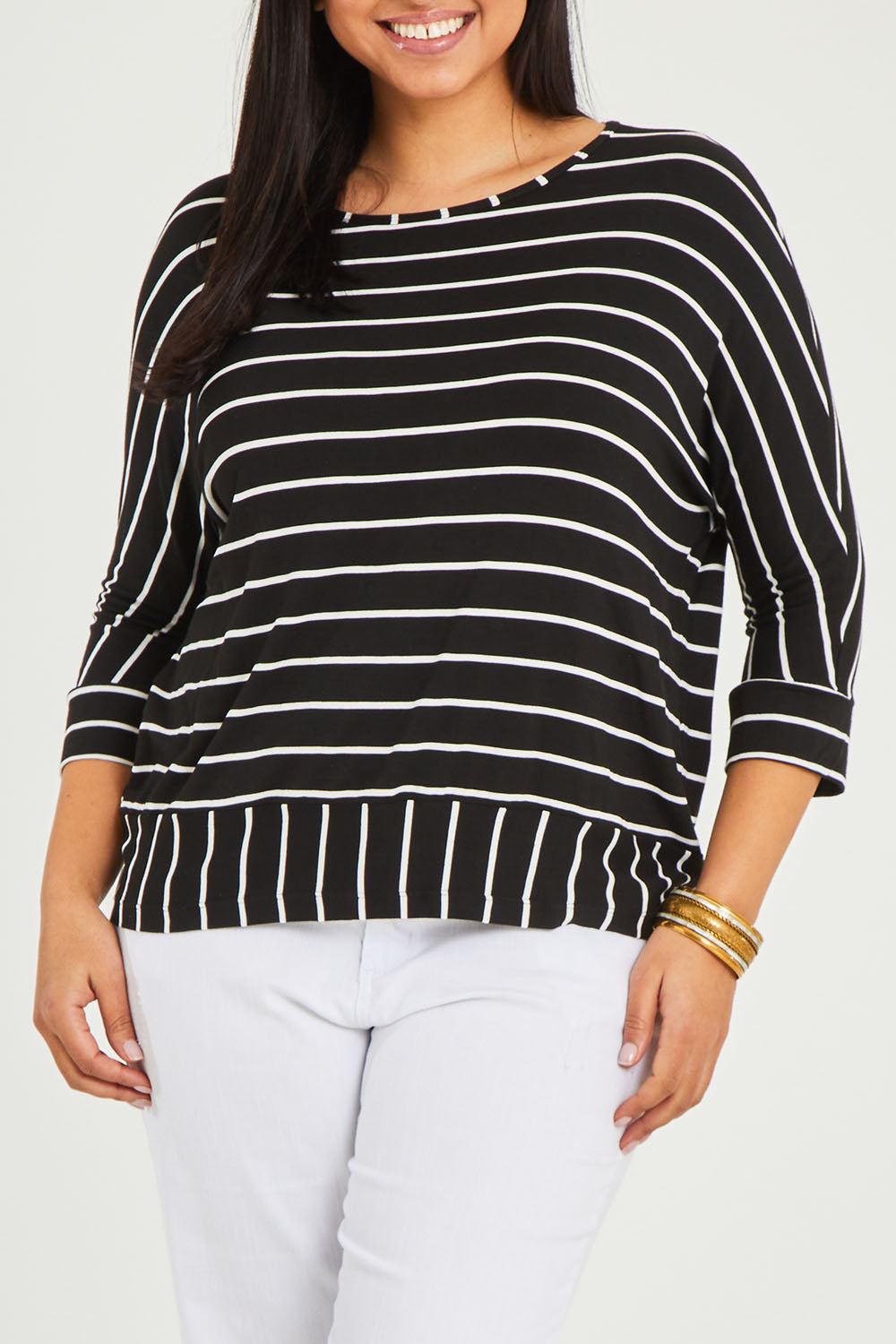 Model Terri-Leigh wearing size 14 of The Striped Blocked Tee in colour Blackwhite (Black), from the front, cropped image