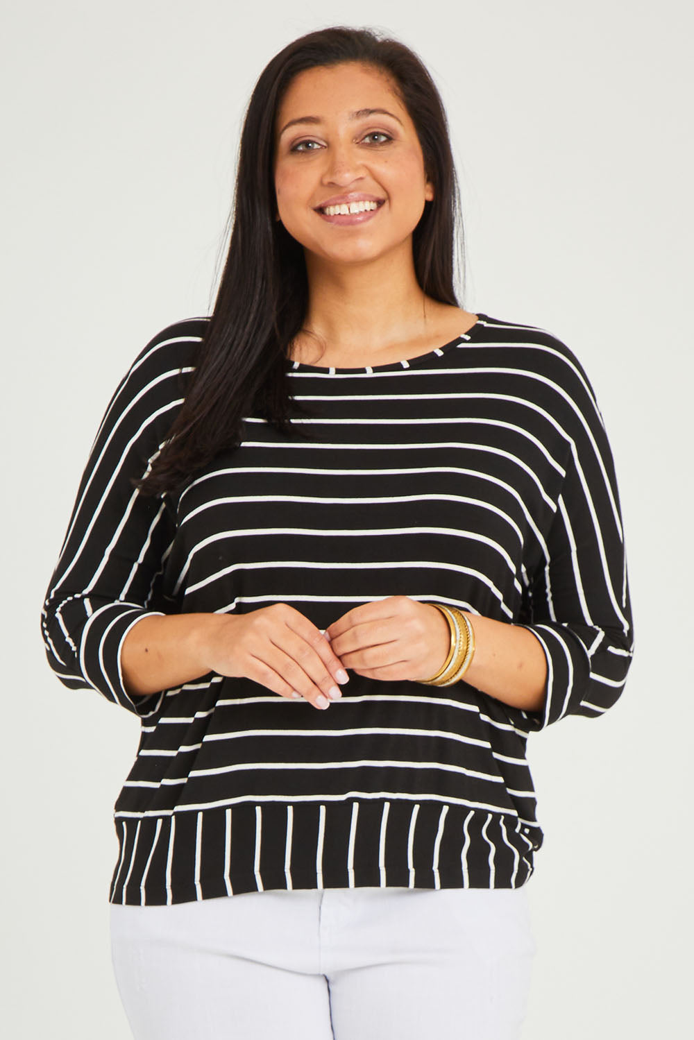 Model Terri-Leigh wearing size 14 of The Striped Blocked Tee in colour Blackwhite (Black), from the front, cropped image
