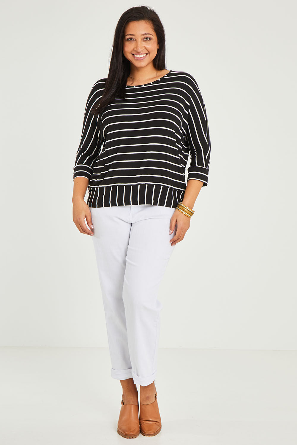 Model Terri-Leigh wearing size 14 of The Striped Blocked Tee in colour Blackwhite (Black), from the front, showing the whole outfit