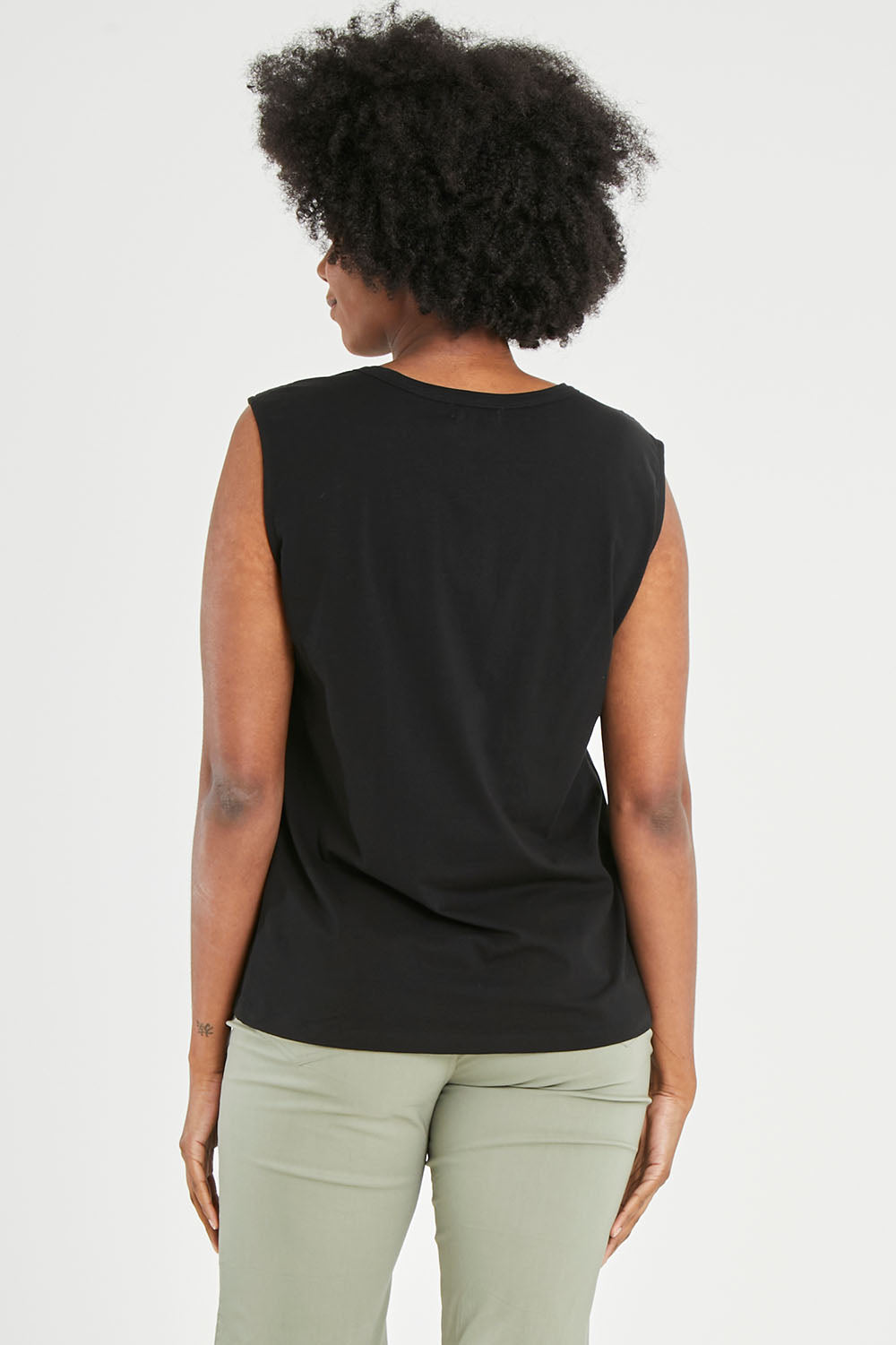 Model Aiyana wearing size 10 of The Lace Insert Tank in colour Black (Black), from the back