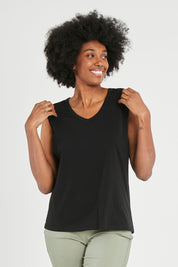 Model Aiyana wearing size 10 of The Lace Insert Tank in colour Black (Black), from the front, cropped image