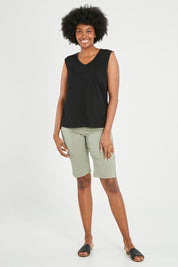 Model Aiyana wearing size 10 of The Lace Insert Tank in colour Black (Black), from the front, showing the whole outfit