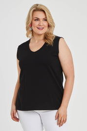 Model Keeara wearing size 16 of The Lace Insert Tank in colour Black (Black), from the front, cropped image