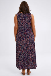 Model Monique wearing size 14 of The High Low Summer Dress in colour Navyred (Blue), from the back