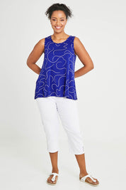 Model Noli wearing size 14 of The Printed Summer Tank in colour Royalblue (Blue), from the front, showing the whole outfit