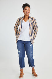 Model Noli wearing size 14 of The Striped Boyfriend Blazer in colour Camelstrip, from the front, showing the whole outfit