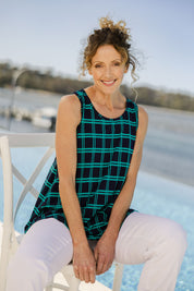 Model Emma wearing size 10 of The Printed Drape Tank in colour Navycheck (Blue), from the front, showing the whole outfit