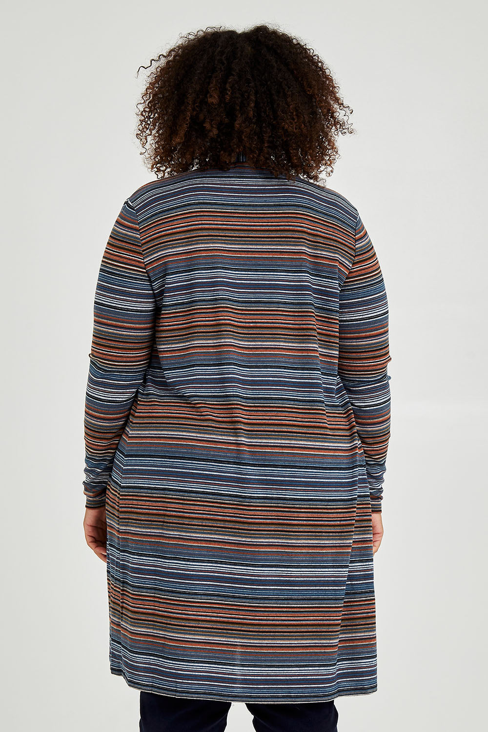 Model Alexis wearing size 16 of The Striped Edge To Edge Knit Cardigan in colour Denim (Blue), from the back