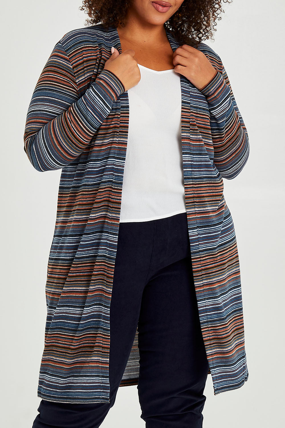 Model Alexis wearing size 16 of The Striped Edge To Edge Knit Cardigan in colour Denim (Blue), from the front, cropped image