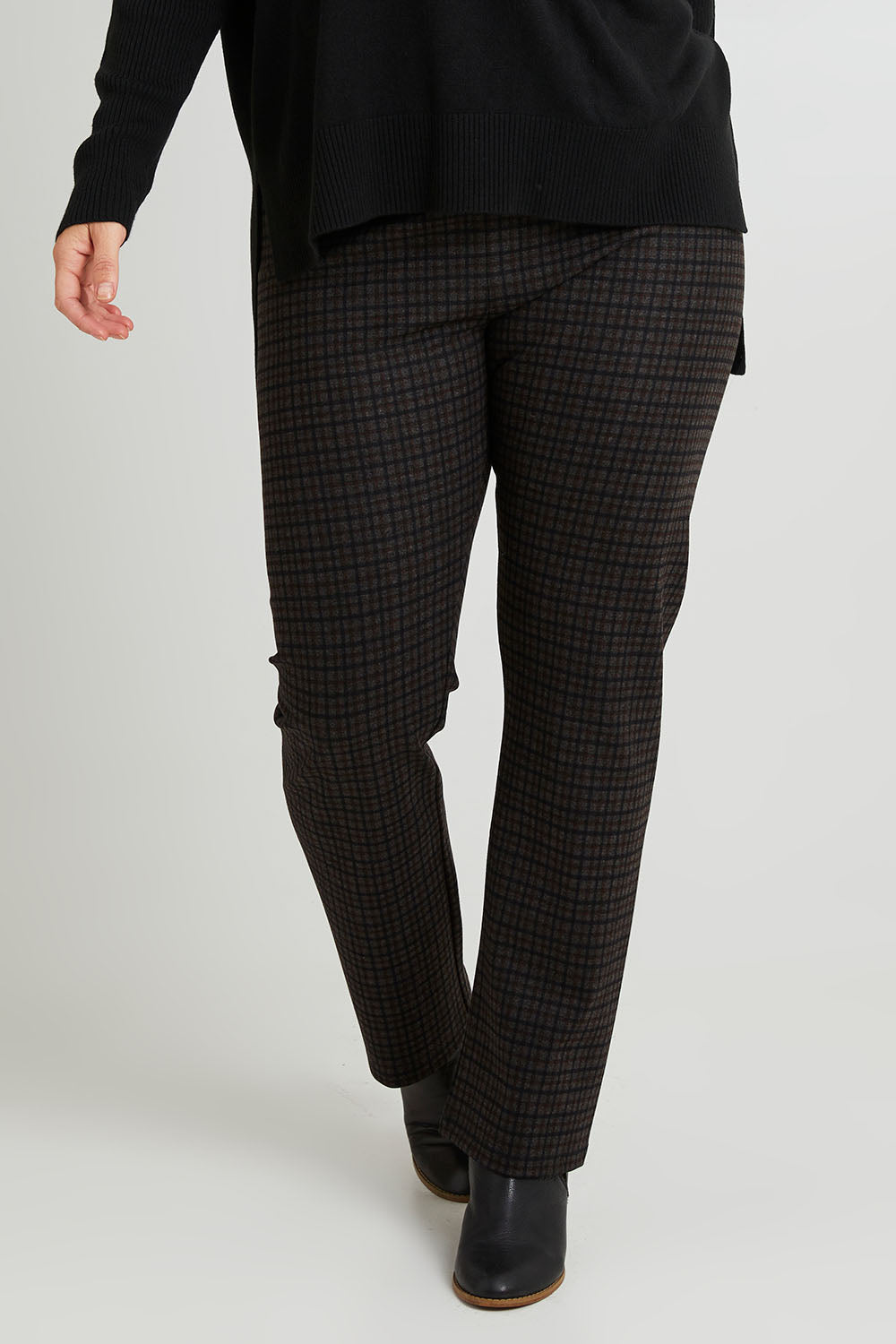 Model Laura wearing size 14 of The Ponte Check Pant in colour Blackbrown (Black), from the front, cropped image