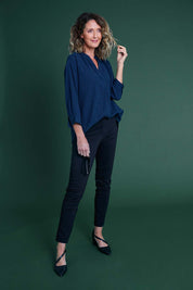 Model Emma wearing size 10 of The Nehru Collar Textured Top in colour Navy (Blue), from the front, showing the whole outfit