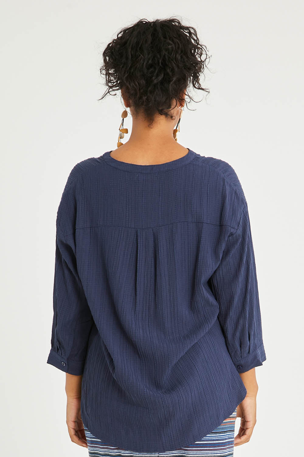 Model Noli wearing size 14 of The Nehru Collar Textured Top in colour Navy (Blue), from the back
