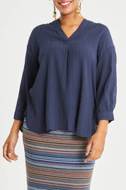 Model Noli wearing size 14 of The Nehru Collar Textured Top in colour Navy (Blue), from the front, cropped image