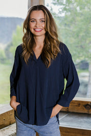 Model Tahlia wearing size 10 of The Nehru Collar Textured Top in colour Navy (Blue), from the front, showing the whole outfit