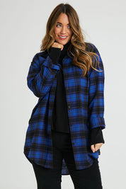 Model Laura wearing size 14 of The Oversized Checked Shirt in colour Cobaltblue (Blue), from the front, cropped image