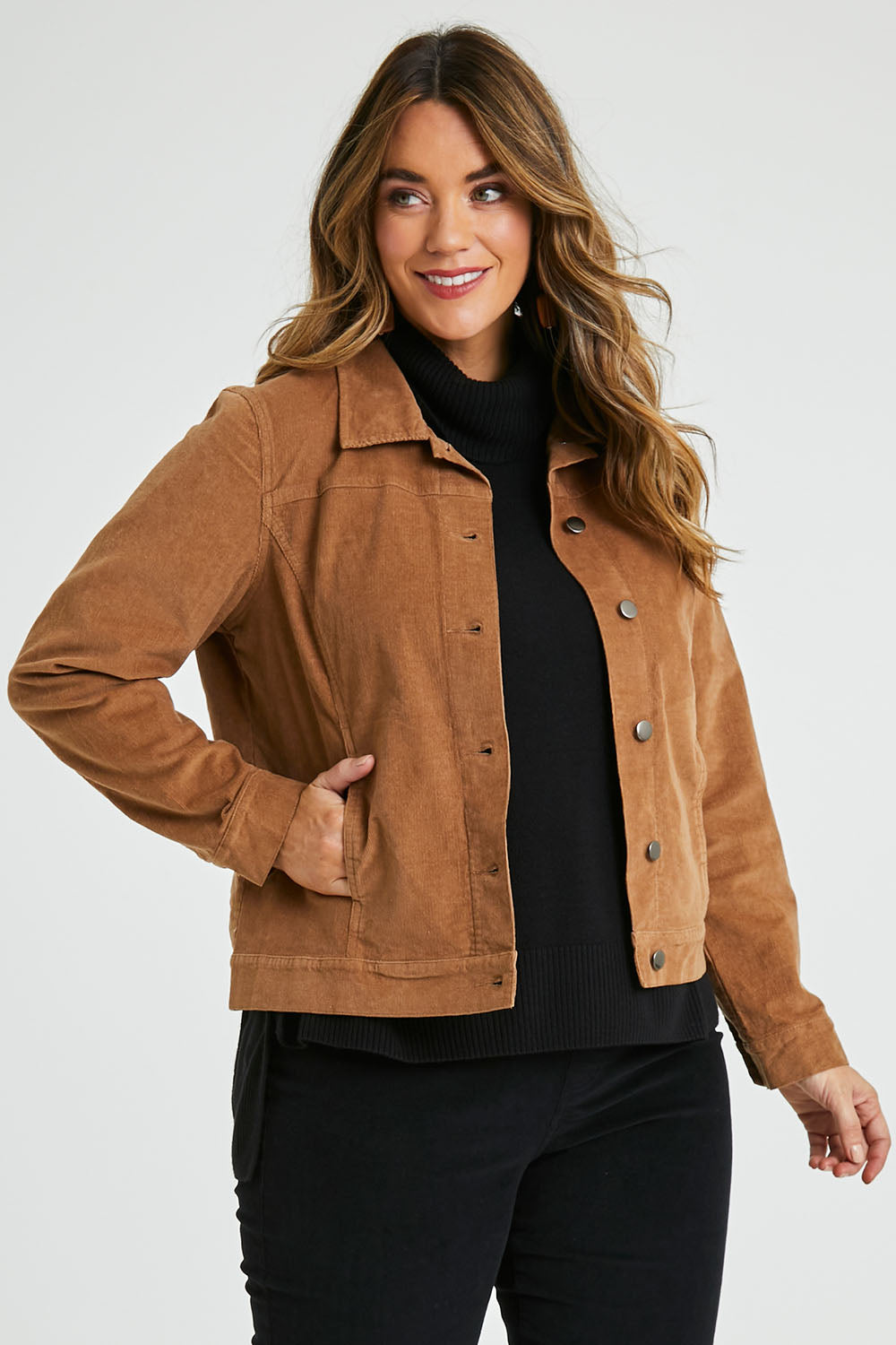 Model Laura wearing size 14 of The Cord Casual Jacket in colour Camel, from the front, cropped image