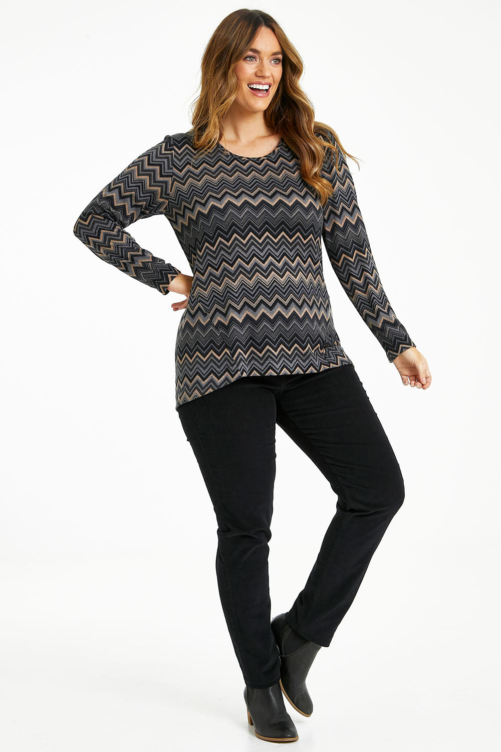 Model Laura wearing size 14 of The Printed Crew Neck Knit Jumper in colour Multiprint (Grey), from the front, showing the whole outfit