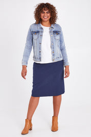 Model Anucia wearing size 14 of The Ponte Jacquard Skirt in colour Navy (Blue), from the front, showing the whole outfit