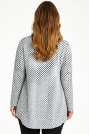 Model Laura wearing size 14 of The Spot Swing Knit Tee in colour Greymarle (Grey), from the back