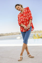 Model Emma wearing size 10 of The Cotton Blend 3/4 Pant in colour Chambray (Blue), from the front, showing the whole outfit