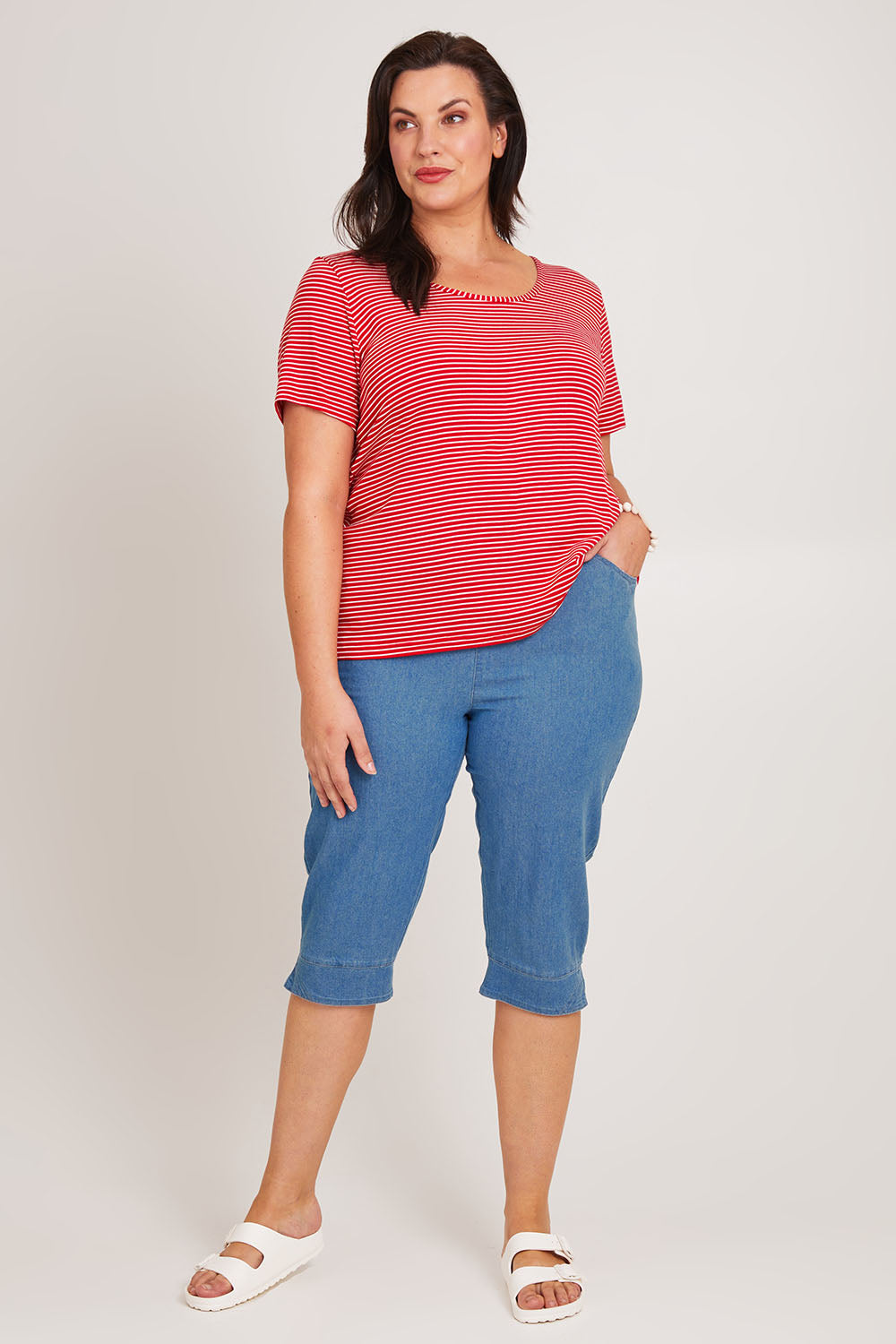 Model Poppy wearing size 16 of The Cotton Blend 3/4 Pant in colour Chambray (Blue), from the front, showing the whole outfit