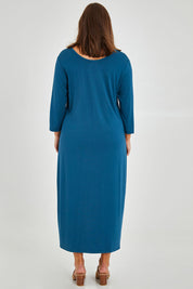 Model Monique wearing size 14 of The Bamboo 3/4 Sleeve Maxi Dress in colour Blueberry (Blue), from the back
