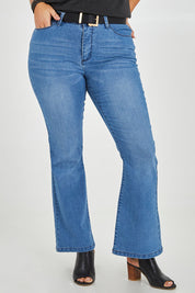 Model Monique wearing size 14 of The Contour Bootleg Jean in colour Lightdenim (Blue), from the front, cropped image