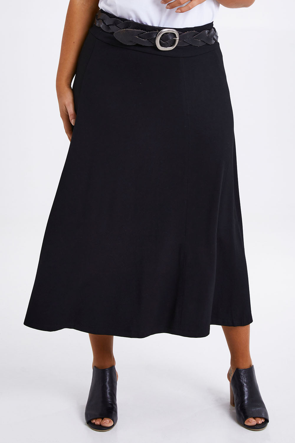 Model Monique wearing size 14 of The Fit & Flare Summer Skirt in colour Black (Black), from the front, cropped image