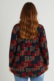 Model Laura wearing size 14 of The Printed Knit Swing Tee in colour Navycheck (Blue), from the back